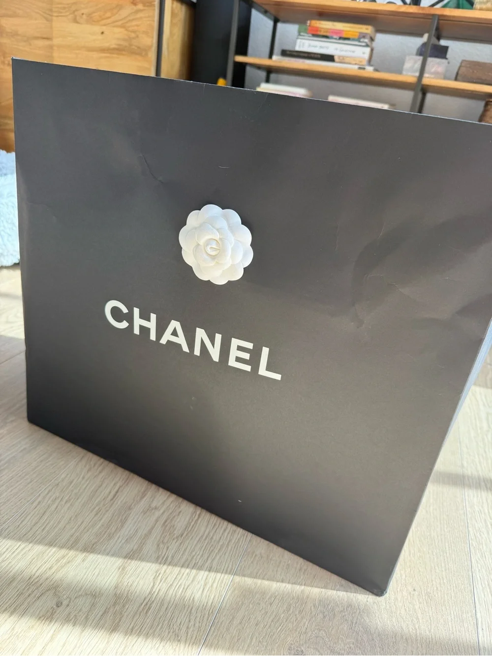 Authentic CHANEL Black and White shopping bag with Camellia Accents